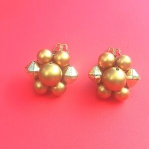 Vintage pair of Plastic Gold Tone Earrings. Stamped Japan